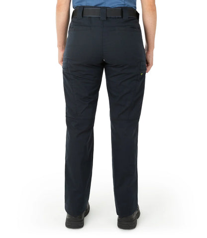 Person wearing navy blue pants on a white background